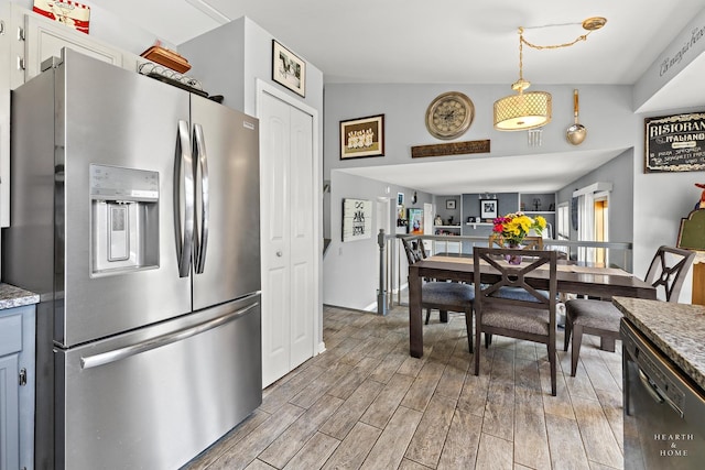 208 Sprucewood Ct, Round Lake Beach, IL 60073 - kitchen with appliances with stainless steel finishes, light wood-style flooring, and decorative light fixtures