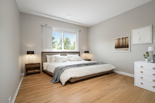 9249 Kildare Ave, Skokie, IL 60077 - bedroom with light wood-type flooring and baseboards