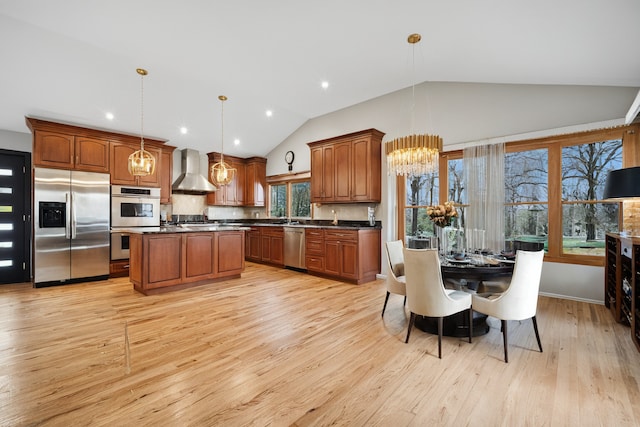 9249 Kildare Ave, Skokie, IL 60077 - kitchen with stainless steel appliances, wall chimney exhaust hood, a chandelier, lofted ceiling, and dark countertops