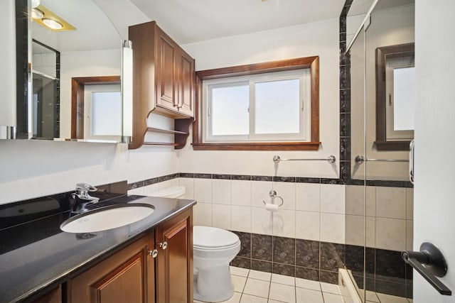 9249 Kildare Ave, Skokie, IL 60077 - full bath with a stall shower, vanity, tile patterned floors, and tile walls