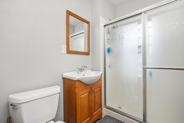 2142 N Mobile Ave, Chicago, IL 60639 - full bathroom featuring vanity, toilet, and a stall shower