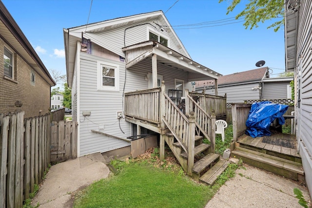 2142 N Mobile Ave, Chicago, IL 60639 - back of property featuring a wooden deck