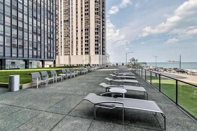 surrounding community featuring a water view