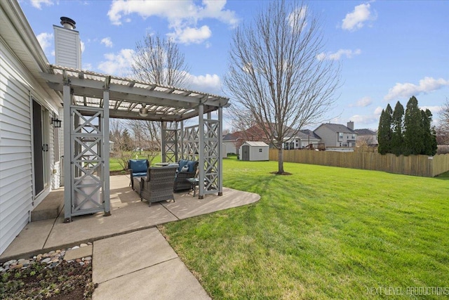 view of yard with a storage shed, an outbuilding, a fenced backyard, a pergola, and a patio area