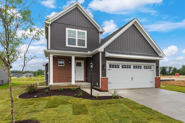 craftsman inspired home featuring a front lawn, brick siding, a garage, board and batten siding, and driveway