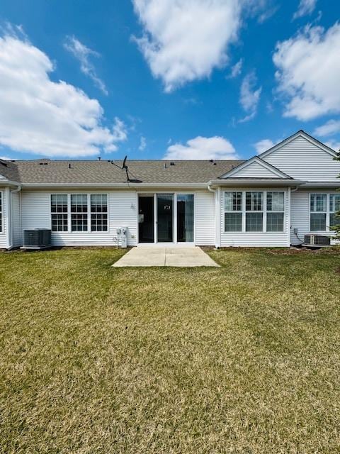 11246 Bellflower Ln, Huntley, IL 60142 - back of property featuring a patio area, central AC unit, and a yard