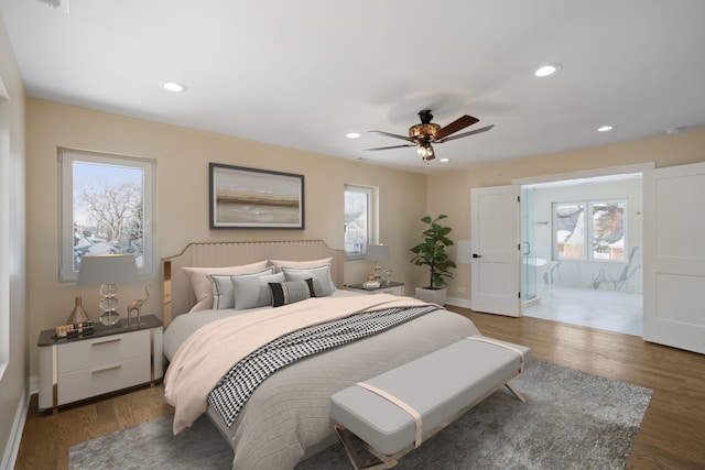 bedroom featuring wood finished floors, baseboards, a ceiling fan, and recessed lighting
