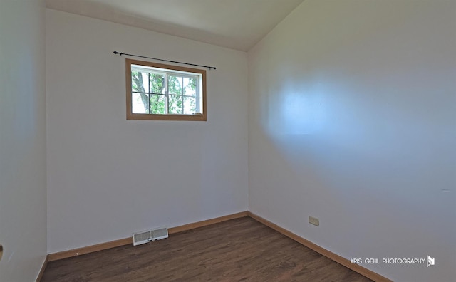 1032 Brentwood Dr, Round Lake Beach, IL 60073 - unfurnished room featuring dark wood-style floors and baseboards