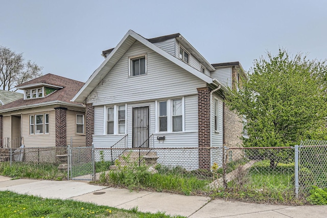 8151 S Bennett Ave, Chicago, IL 60617 - bungalow-style house featuring a gate and a fenced front yard