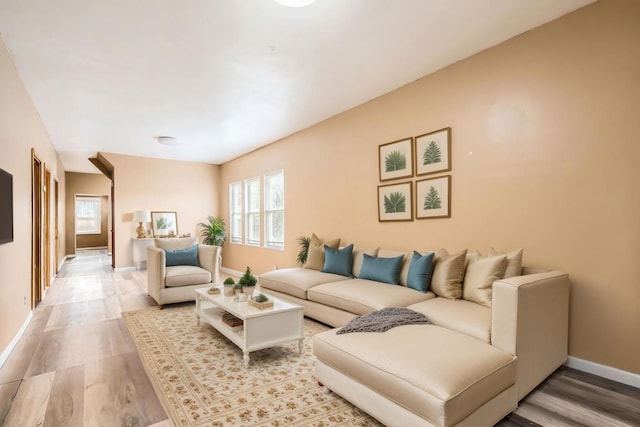 8151 S Bennett Ave, Chicago, IL 60617 - living room featuring baseboards and light wood finished floors