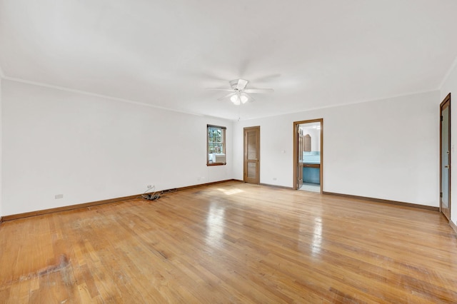 unfurnished room featuring ceiling fan, baseboards, and light wood-style floors