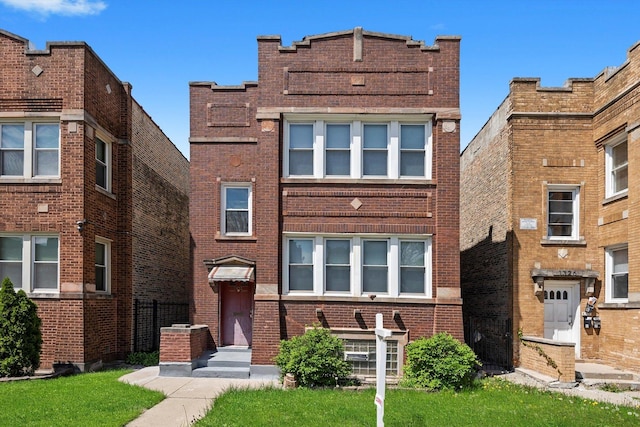 1322 N Lockwood Ave, Chicago, IL 60651 - front facade featuring brick siding