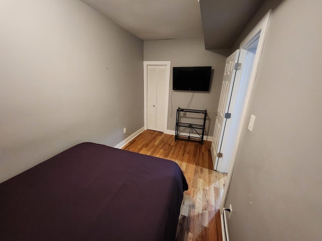1022 N Rockwell St, Chicago, IL 60622 - bedroom featuring light wood-type flooring and baseboards