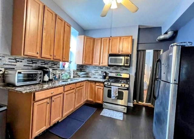 1022 N Rockwell St, Chicago, IL 60622 - kitchen featuring a sink, appliances with stainless steel finishes, dark wood finished floors, backsplash, and a toaster