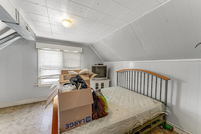 2225 S Kirkland Ave, Chicago, IL 60623 - bedroom with baseboards and vaulted ceiling