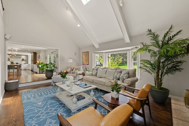 living area featuring baseboards, high vaulted ceiling, wood finished floors, and beam ceiling