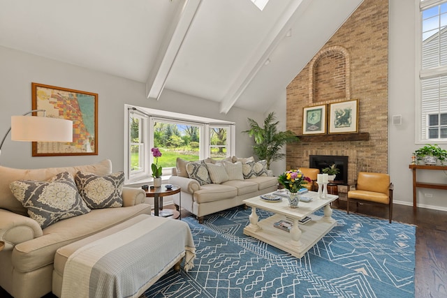 living area featuring a brick fireplace, beam ceiling, wood finished floors, high vaulted ceiling, and baseboards