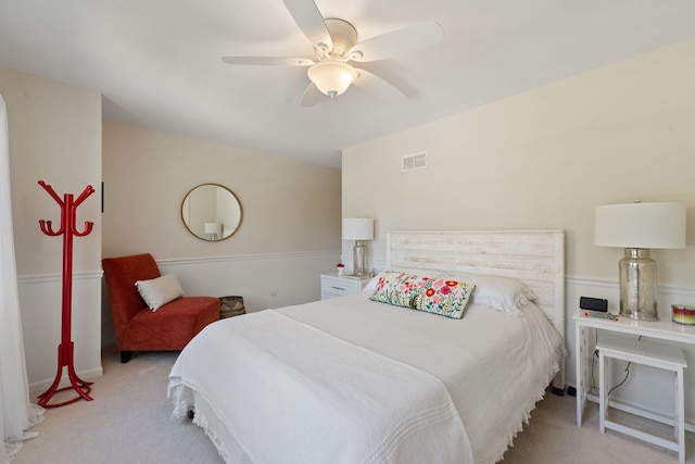 bedroom featuring ceiling fan, carpet flooring, and visible vents