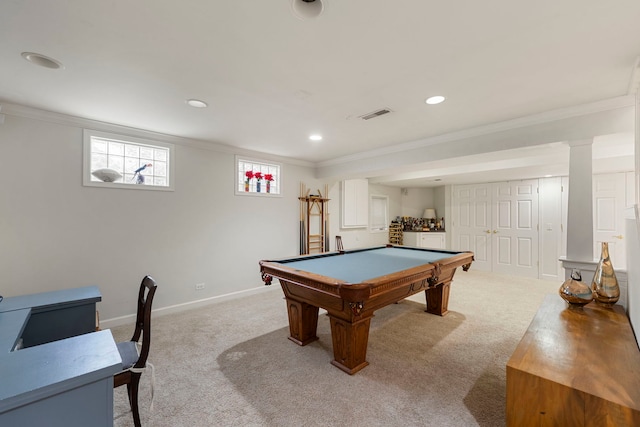 recreation room with crown molding, visible vents, and carpet
