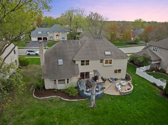birds eye view of property with a residential view