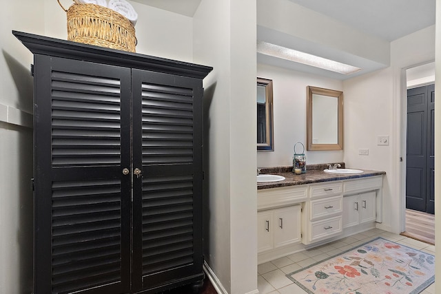 506 Aberdeen Rd, Frankfort, IL 60423 - bathroom with tile patterned floors, double vanity, and baseboards