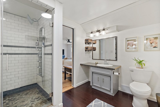 506 Aberdeen Rd, Frankfort, IL 60423 - ensuite bathroom featuring wood finished floors, a stall shower, toilet, vanity, and baseboards