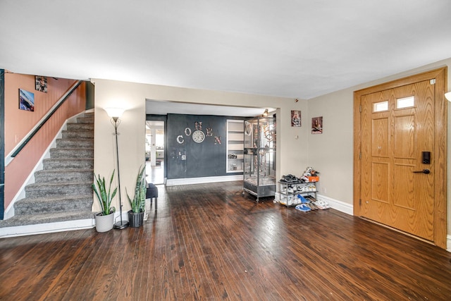 824 Rowlett Ave, Melrose Park, IL 60164 - foyer entrance featuring wood finished floors, baseboards, and stairway