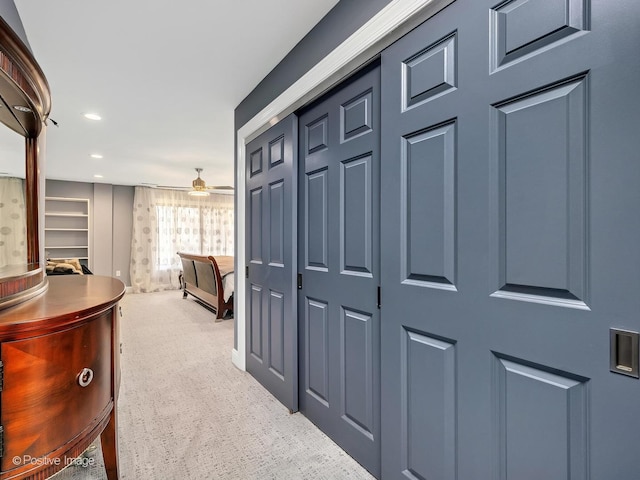 hallway with recessed lighting and carpet flooring