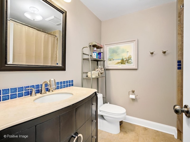 full bath with tile patterned flooring, a shower with curtain, toilet, vanity, and baseboards