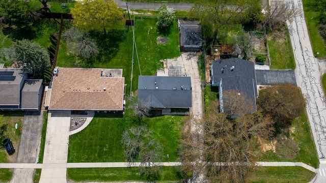 surrounding community with fence and a yard