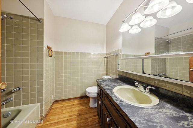 empty room with baseboards, visible vents, and light wood-style floors