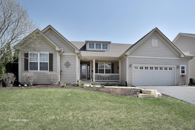 459 E Amberside Dr, Elgin, IL 60124 - view of front facade with covered porch, concrete driveway, an attached garage, a front lawn, and roof with shingles