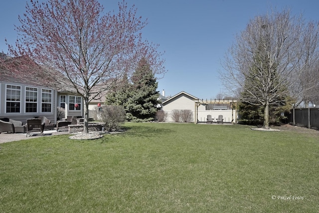 459 E Amberside Dr, Elgin, IL 60124 - fenced backyard with a patio and an outdoor living space
