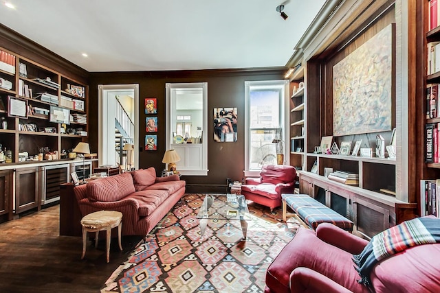 351 W Belden Ave, Chicago, IL 60614 - living area featuring built in features, crown molding, wine cooler, stairs, and dark wood-type flooring