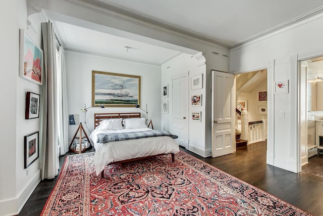 351 W Belden Ave, Chicago, IL 60614 - bedroom featuring dark wood-type flooring, ornamental molding, and a baseboard radiator