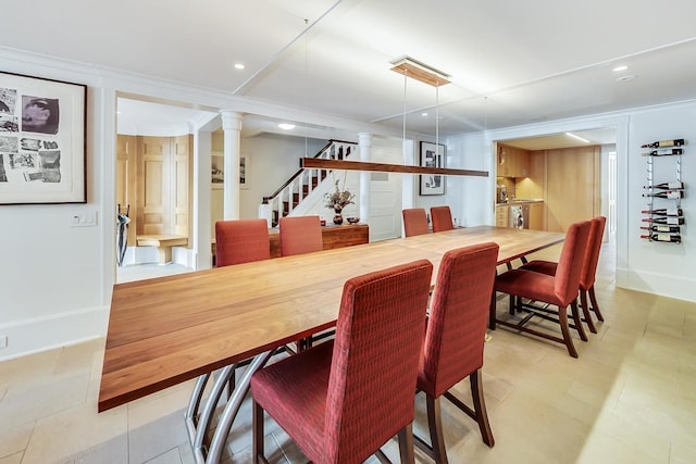 351 W Belden Ave, Chicago, IL 60614 - dining room featuring recessed lighting, stairs, ornate columns, and washer and clothes dryer