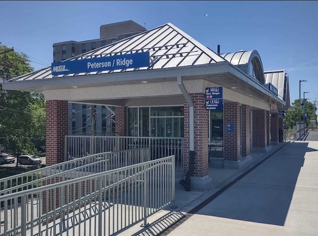 view of building exterior with central air condition unit
