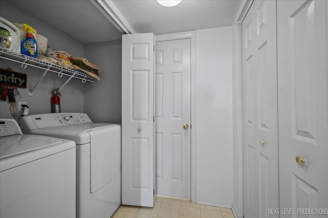 19 Vernon Ct, South Elgin, IL 60177 - laundry area with separate washer and dryer and baseboards