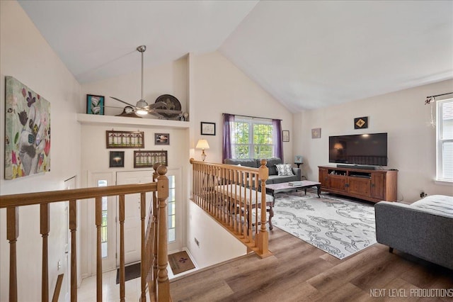 19 Vernon Ct, South Elgin, IL 60177 - living area featuring wood finished floors, high vaulted ceiling, and ceiling fan