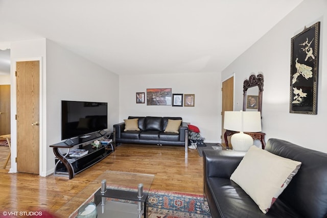 205 Circle Ave Unit 2B, Forest Park, IL 60130 - living room featuring wood finished floors and baseboards