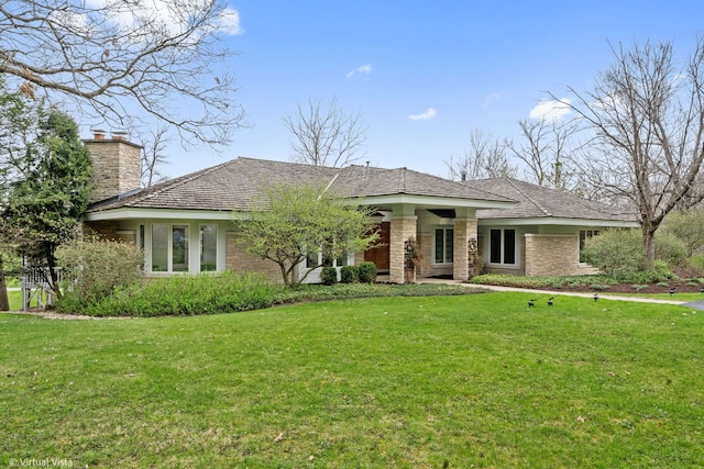 14567 S 82nd Ave, Orland Park, IL 60462 - view of front of house with a front lawn and a chimney