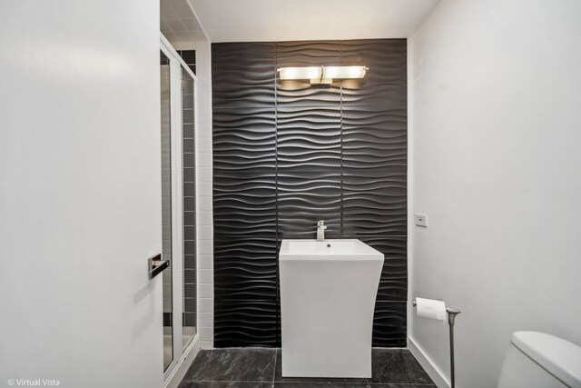 14567 S 82nd Ave, Orland Park, IL 60462 - bathroom featuring a shower stall, toilet, a sink, and baseboards