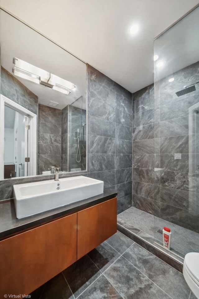 14567 S 82nd Ave, Orland Park, IL 60462 - full bath with tile walls, toilet, vanity, and a walk in shower