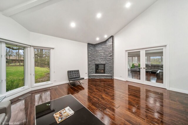 14567 S 82nd Ave, Orland Park, IL 60462 - unfurnished living room with french doors, plenty of natural light, baseboards, wood finished floors, and high vaulted ceiling