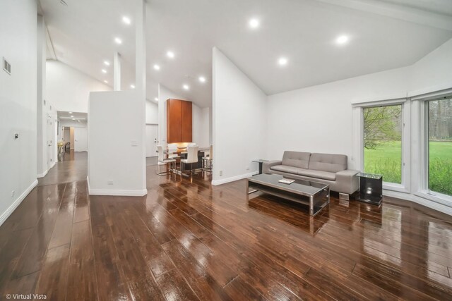 14567 S 82nd Ave, Orland Park, IL 60462 - living area featuring baseboards, visible vents, high vaulted ceiling, and wood-type flooring