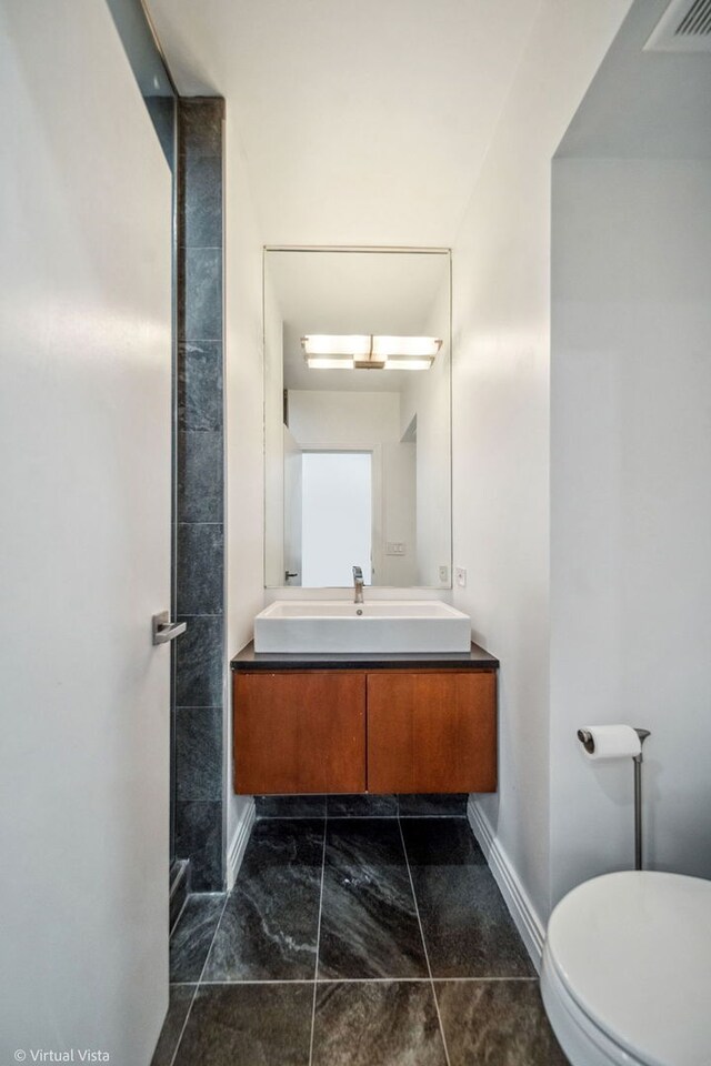 14567 S 82nd Ave, Orland Park, IL 60462 - bathroom featuring toilet, visible vents, baseboards, marble finish floor, and vanity