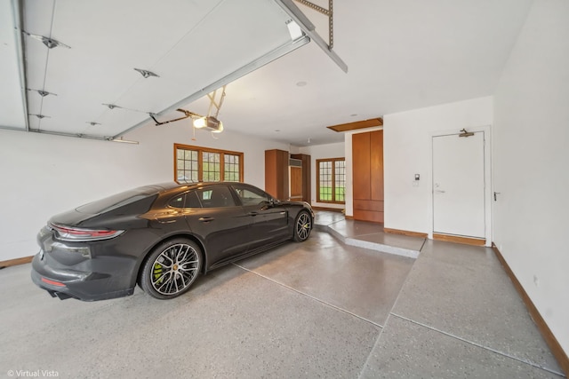 14567 S 82nd Ave, Orland Park, IL 60462 - garage with a garage door opener, french doors, and baseboards