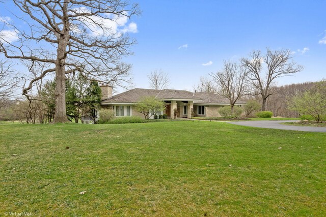 14567 S 82nd Ave, Orland Park, IL 60462 - single story home with driveway, a front lawn, and a chimney