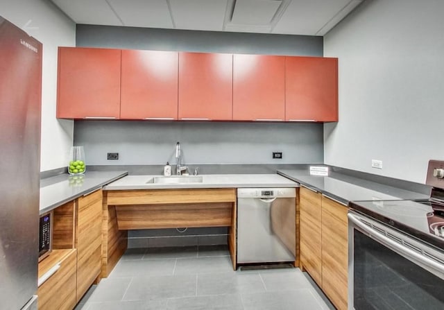 3660 N Lake Shore Dr Unit 711, Chicago, IL 60613 - kitchen featuring light tile patterned floors, stainless steel appliances, and a sink