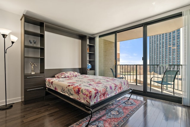 3660 N Lake Shore Dr Unit 711, Chicago, IL 60613 - bedroom with baseboards, access to exterior, and dark wood-style floors